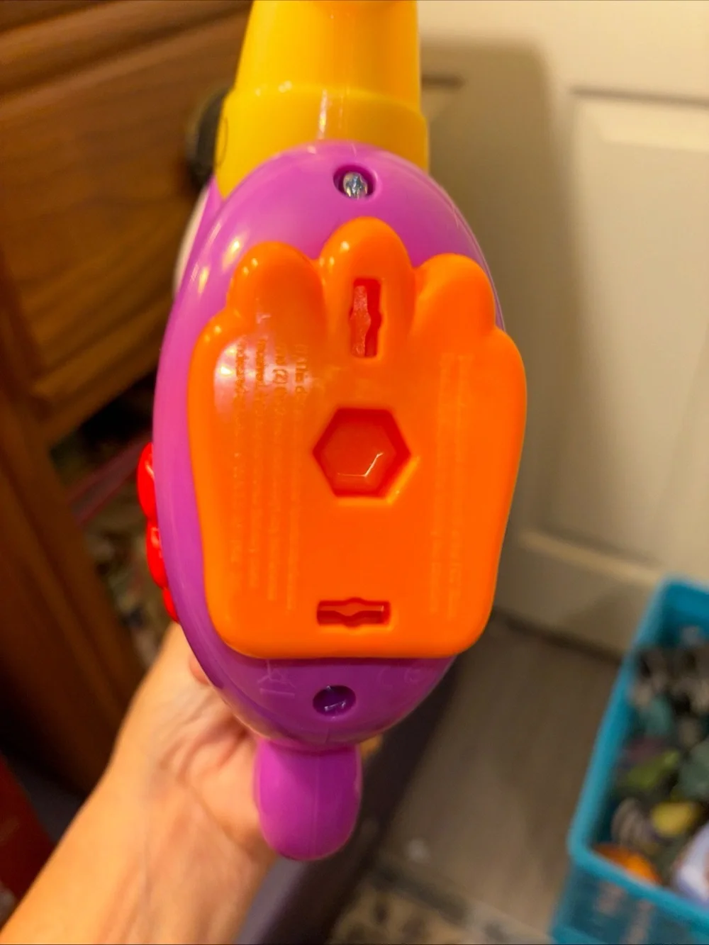 Fisher-Price Vibrant Purple Parrot Toy with Yellow Beak works great